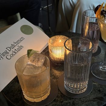 Flying Dutchmen Cocktails - Umami Margarita (left) and Flying Dutchmen (right) - Cocktail Bars Near Me - Amsterdam, New Hampshire Flying Dutchmen Cocktails - Umami Margarita (left) and Flying Dutchmen (right) - Cocktail Bars Near Me - Amsterdam, New Hampshire
