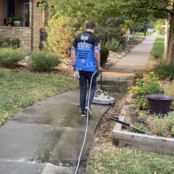 Super PowerWash Bros - One of our technicians surface cleaning a sidewalk - Pressure Washers Near Me - Frederick, Colorado Super PowerWash Bros - One of our technicians surface cleaning a sidewalk - Pressure Washers Near Me - Frederick, Colorado