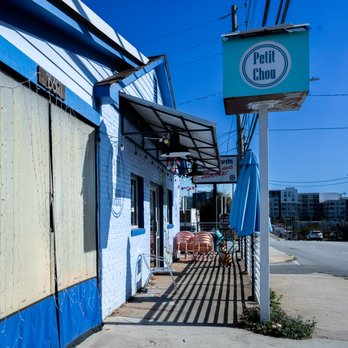 Petit Chou - a blue building with a sign on it - Breakfast & Brunch Near Me - Atlanta, Georgia