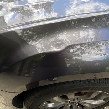 Incidents Paintless Dent Removal - Front left fender, before - Body Shops Near Me