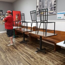 a man standing in a waiting room a man standing in a waiting room