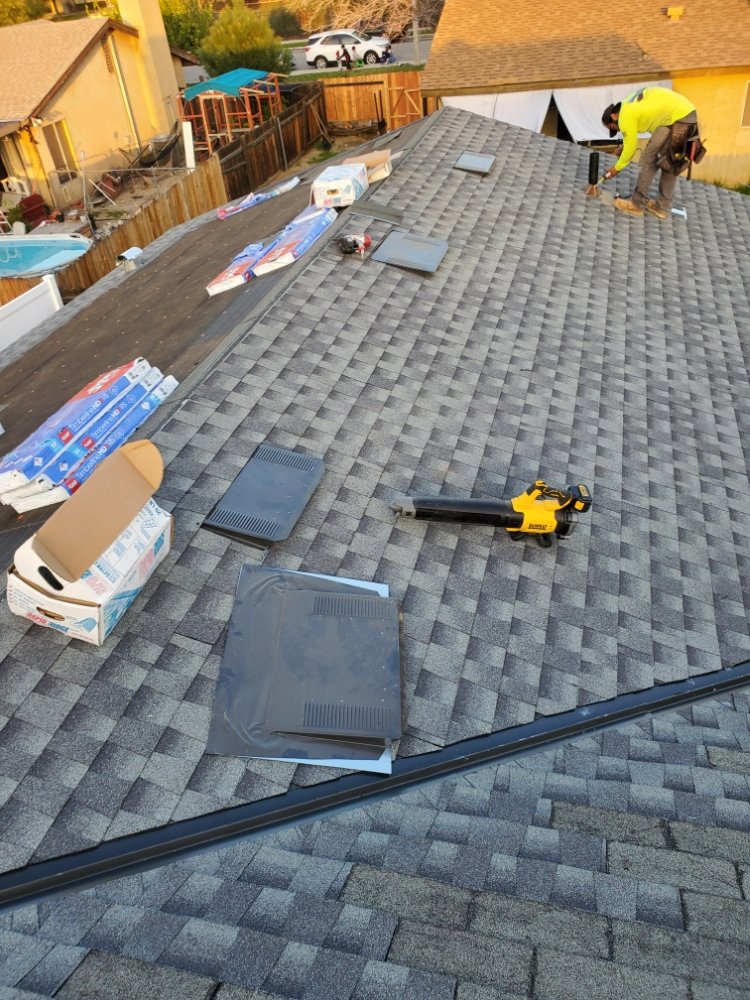 Slide of Eleazars Roofing