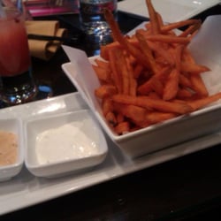 Thi Fusion Lounge And Bar Restaurant - Sweet potato fries with chipotle dip (left), and herb dip (right). $6.00