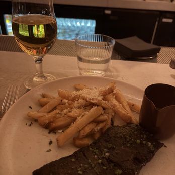 Dēliz - Steak and frites with a peppercorn sauce. - Italian Near Me - Chicago, Illinois Dēliz - Steak and frites with a peppercorn sauce. - Italian Near Me - Chicago, Illinois