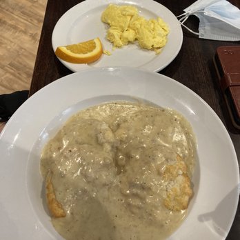 Famous Toastery - Biscuits and gravy. - American Near Me - Concord, North Carolina