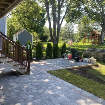 Felipe Landscaping - patio and new shed base with new Arborvitaes - Landscaping Near Me