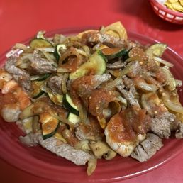Steak and shrimp fajita nachos! They added mushrooms and zucchini!!! Always unbelievable! Steak and shrimp fajita nachos! They added mushrooms and zucchini!!! Always unbelievable!