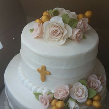 Vanilla Bean Bakery - A beautiful two tier cinnamon and carrot cakes with buttercream icing and fondant flowers for a lovely baby girls baptism. - Bakeries Near Me - Indianapolis, Indiana Vanilla Bean Bakery - A beautiful two tier cinnamon and carrot cakes with buttercream icing and fondant flowers for a lovely baby girls baptism. - Bakeries Near Me - Indianapolis, Indiana