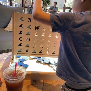 Big Wave Coffeehouse - Kiddo enjoying some of the games while I enjoy a morning cold brew on a hot Folsom day - Coffee & Tea Near Me - Folsom, California