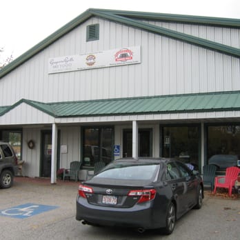 Drop-In Brewing Company - parking lot with cars - Breweries Near Me - Middlebury, Vermont Drop-In Brewing Company - parking lot with cars - Breweries Near Me - Middlebury, Vermont