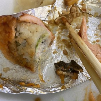 Dono Sushi Cafe - Plastic that was in between California roll and salmon/eel. - Sushi Bars Near Me - Chino, California