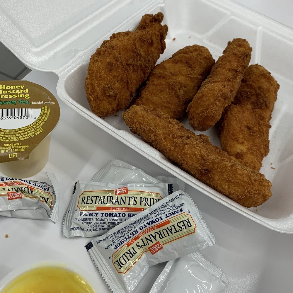 John's Burgers - a tray of fried chicken and a cup of mustard - Burgers Near Me - Franklin, Tennessee John's Burgers - a tray of fried chicken and a cup of mustard - Burgers Near Me - Franklin, Tennessee