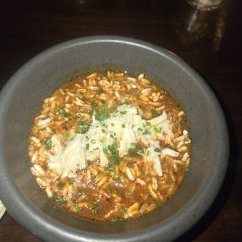 Dakar - Soup/stew with crispy puffed rice topped with crabmeat - Senegalese Near Me - New Orleans, Louisiana Dakar - Soup/stew with crispy puffed rice topped with crabmeat - Senegalese Near Me - New Orleans, Louisiana