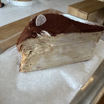 Light On The Sugar Bakery Cafe - Tiramisu crepe cake - Coffee & Tea Near Me - Orlando, Florida Light On The Sugar Bakery Cafe - Tiramisu crepe cake - Coffee & Tea Near Me - Orlando, Florida