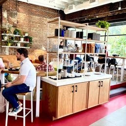 two men sitting at a counter two men sitting at a counter
