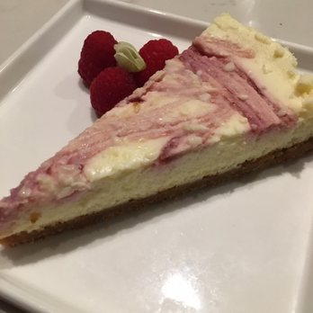 Portrait Gallery Restaurant - Raspberry cheesecake made in house - Cocktail Bars Near Me - Matthews, North Carolina