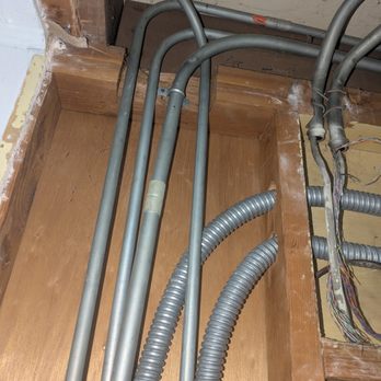 Lightland Electric - Lightland ably left the older EMT alone and converted to old in-bathroom panel to a pull box. Saved $$$$$! - Electricians Near Me - Freedom, California