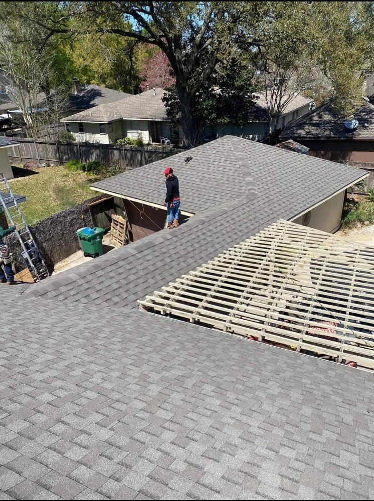 Slide of Archie's Roofing & Construction