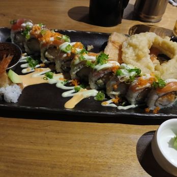 Maru Sushi & Grill - Cosmo Signature Roll. Salmon, Tuna, Tempura Shrimp, spicy mayo, avocado, honey wasabi aioli, wasabi tobiko. - Sushi Bars Near Me - Midland, Michigan Maru Sushi & Grill - Cosmo Signature Roll. Salmon, Tuna, Tempura Shrimp, spicy mayo, avocado, honey wasabi aioli, wasabi tobiko. - Sushi Bars Near Me - Midland, Michigan