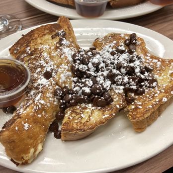 Mayor’s Cafe Miami Lakes - Half French Toast (3 Pieces) with chocolate chip topping - Cafes Near Me - Miami Lakes, Florida Mayor’s Cafe Miami Lakes - Half French Toast (3 Pieces) with chocolate chip topping - Cafes Near Me - Miami Lakes, Florida