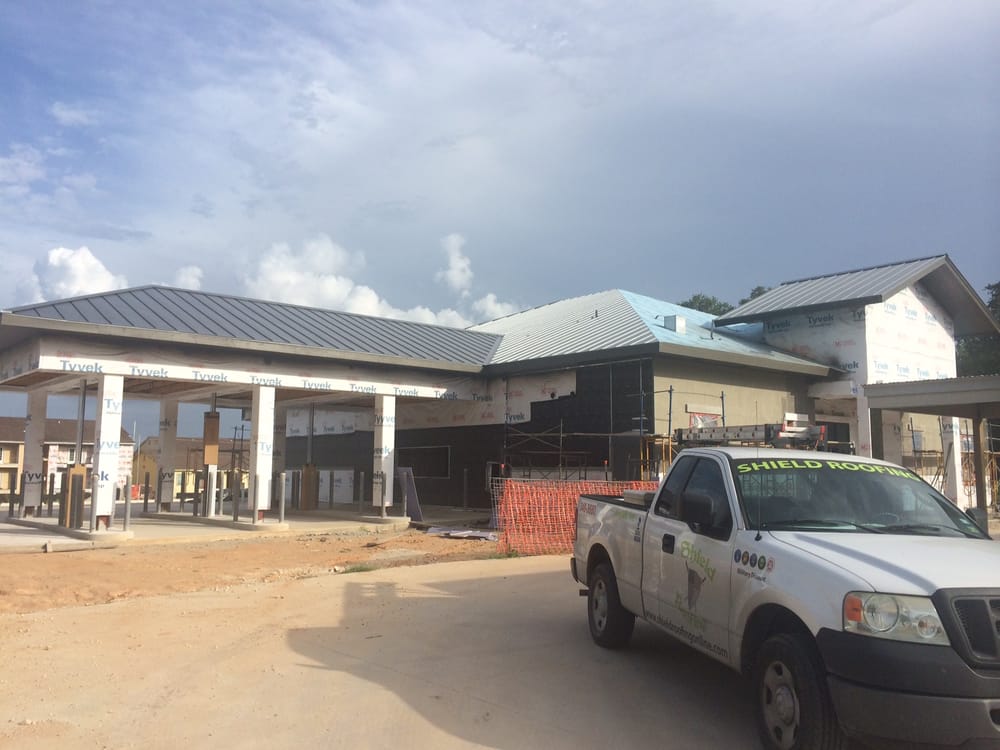 Slide of Shield Roofing