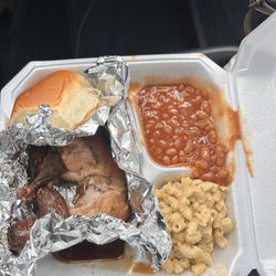 Sho-Nuff Smokehouse Q - Smoked chicken leg quarter, roll, baked beans, Mac & cheese.  Very good food, very juicy chicken.