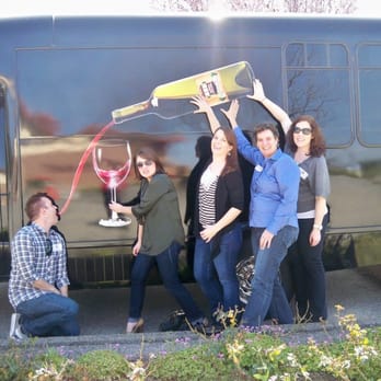 Temecula Valley Cable Car Wine Tours - Group shot in front of the Temecula Valley Cable Car Tour Bus - Wine Tours Near Me - Temecula, California