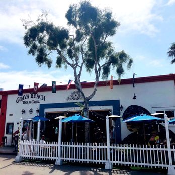 Guava Beach - View of the front and patio dining from Mission Blvd. - Sports Bars Near Me - San Diego, California Guava Beach - View of the front and patio dining from Mission Blvd. - Sports Bars Near Me - San Diego, California