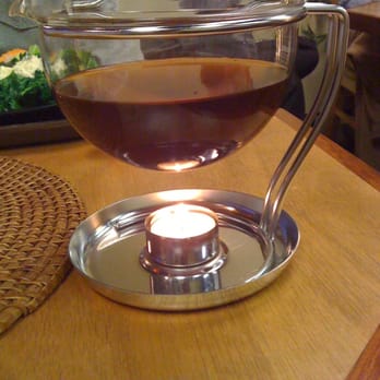 Path Of Tea - half finished large pot of masala chai. note the cute tea candle on the bottom to keep the tea warm. =) - Coffee & Tea Near Me - Houston, Texas