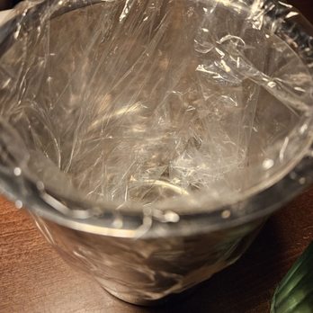 Adam's Chicken & Pocha - Bucket for chicken bones - Korean Near Me - Flushing, New York