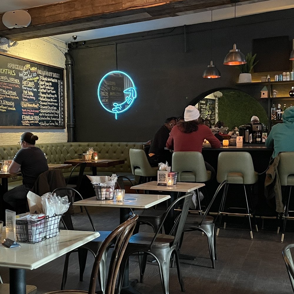 Franklin Park - people sitting at tables in a restaurant - Bars Near Me - Brooklyn, New York
