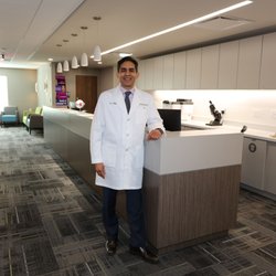 Cleveland Eye Clinic Avon Pointe - Pictured here, Shamik Bafna, M.D. at the technician/nurse's station at the newest Avon Pointe location.