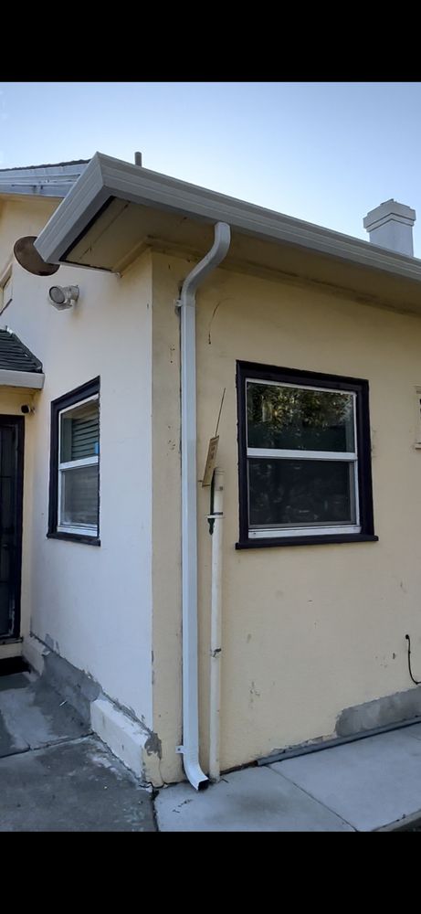 Slide of LAAC Roofing Services