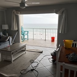 Soleil Vacations - This is after they took the balcony door out and then cleaned up left to go get the correct parts to finish