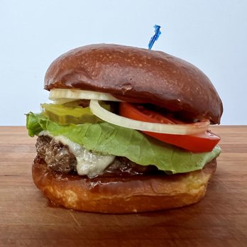 Opportunity Kitchen - a hamburger with lettuce, tomato, and cheese - Coffee & Tea Near Me - Richland, Washington