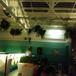 Photo of The Woolly Mammoth Alehouse - Rooftop beer garden.  Complete with dj, giant jenga, lawn bowls and a portrait of the queen