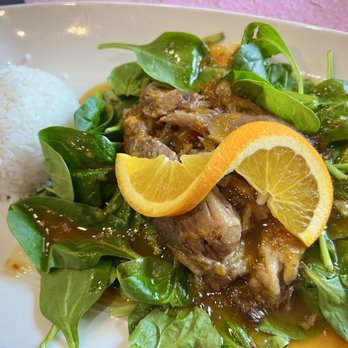Thipi Thai - Orange Duck. Boneless duck marinated with garlic and ginger roasted to tender and drizzled with mango orange tangerine sauce. - Thai Near Me - Glen Ellyn, Illinois