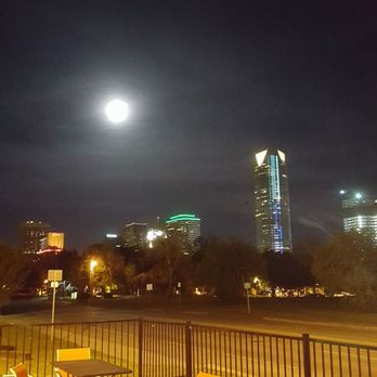The Flea - Enjoy the nighttime view from The Flea patio. - Dive Bars Near Me - Oklahoma City, Oklahoma