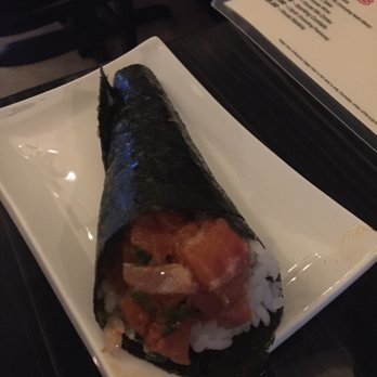 Top Sushi - Hand Rolled Spicy Salmon Roll it's got a delicious Kick. - Sushi Bars Near Me - Houston, Texas Top Sushi - Hand Rolled Spicy Salmon Roll it's got a delicious Kick. - Sushi Bars Near Me - Houston, Texas