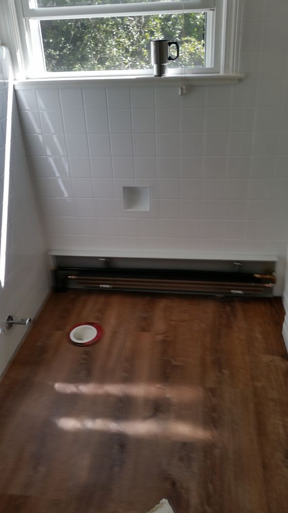 Slide of Lou's Plumbing Services