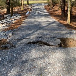 Beagle's Excavation - New culvert pipe eroded from below and around, not from water flowing over, due to pipe installed improperly.