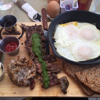 Breakfast Republic - Steak & eggs special! Steak is from the butcher shop @Liberty Station, topped w/a cilantro sauce w/sides of eggs &hash. - Breakfast & Brunch Near Me - San Diego, California