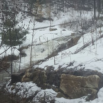 Cartwright Springs - a stream running through a snowy landscape - Breweries Near Me - Pakenham, Ontario