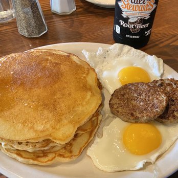 Cracker Barrel Old Country Store - Mommas Pancake Breakfast with sunny side eggs and sausage. - American Near Me - Dalton, Georgia Cracker Barrel Old Country Store - Mommas Pancake Breakfast with sunny side eggs and sausage. - American Near Me - Dalton, Georgia