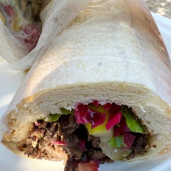 Falafel Hut - a sandwich cut in half on a plate - Falafel Near Me - Montclair, New Jersey