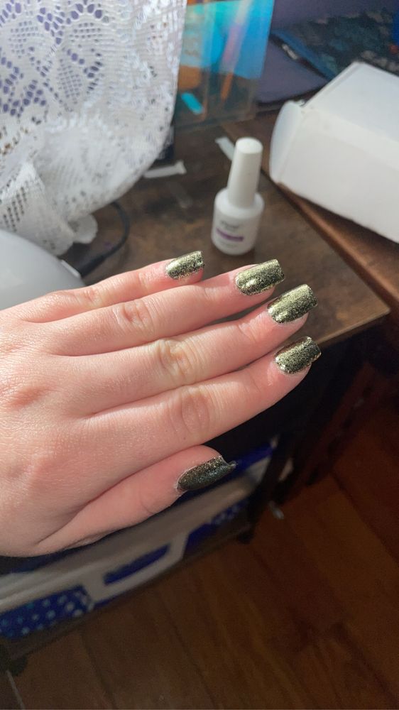 Taylor’s press on nails Logo