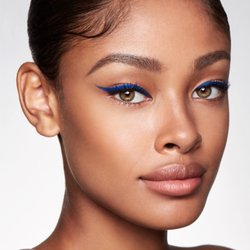Jessica deBen - Winged eyeliner in royal blue and defined brow by makeup artist Jessica deBen (Calabasas, CA)