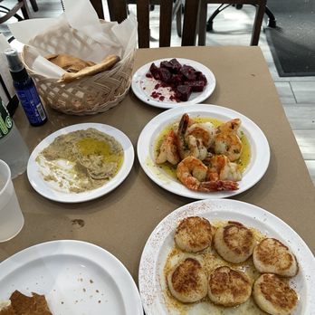 Abuqir Seafood - $73 1/2lb Scallops, 1/2 Tiger Shrimp, Baba ghanoush, Beets, Water - Mediterranean Near Me - Astoria, New York Abuqir Seafood - $73 1/2lb Scallops, 1/2 Tiger Shrimp, Baba ghanoush, Beets, Water - Mediterranean Near Me - Astoria, New York