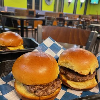Lightning Rounds - two hamburgers on a tray at a fast food restaurant - Burgers Near Me - Lapeer, Michigan