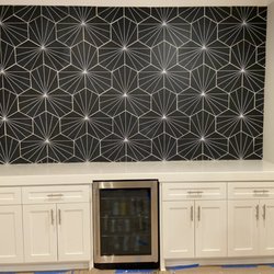 ATL Handyman Services - AFTER Transforming an accent wall with intricate patterned hexagon tile.